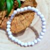 Bracelet en perles de bois blanc